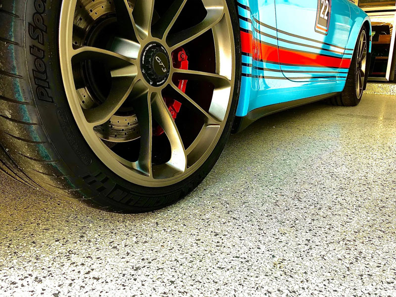 Race car on high-performance garage floor
